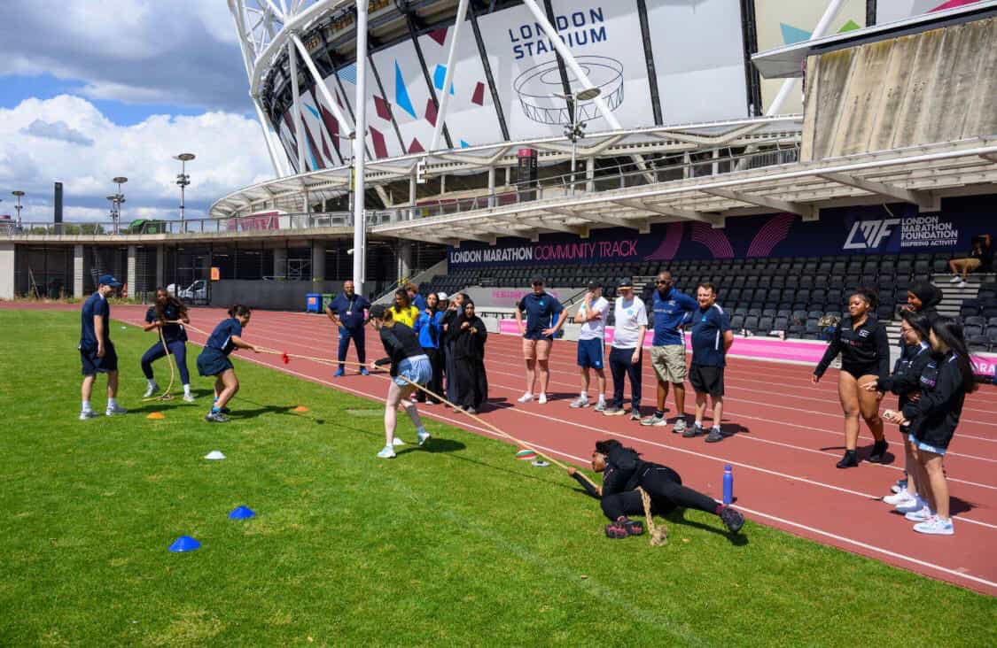 The Change Foundation team training at London Stadium for marathon event.