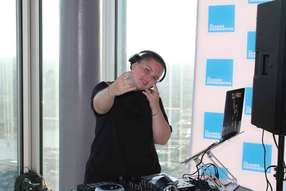 DJ playing music at The Change Foundation conference.